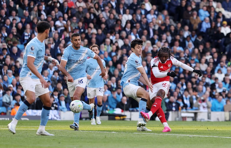 Eberechi Eze of Arsenal takes a shot that hits the post. Photograph: Carl Recine/Getty