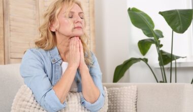 Distressed woman sitting at home.