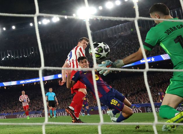 Atletico Madrid storm Nou Camp with Champions League win over 10-man Barcelona