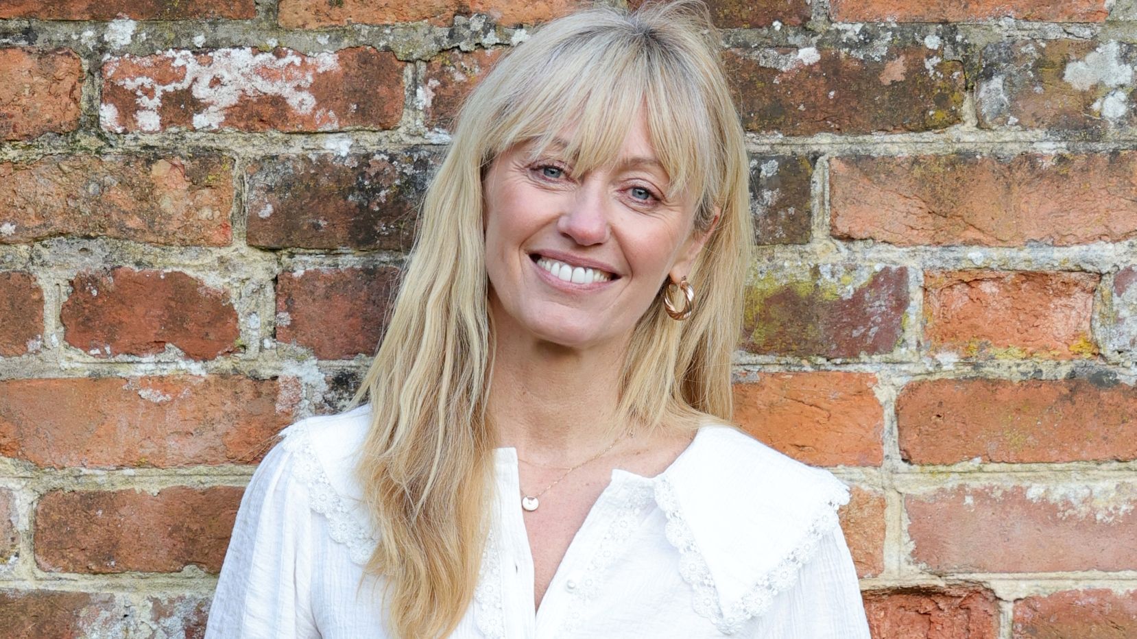 Clodagh McKenna poses to launch the official range of sustainable merchandise on behalf of The Queen's Green Canopy