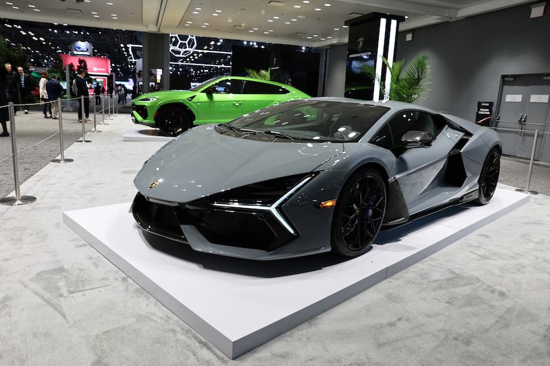 Standout cars such as this Lamborghini have become a symbol of conspicuous consumption. Photograph: Michael M Santiago/Getty Images