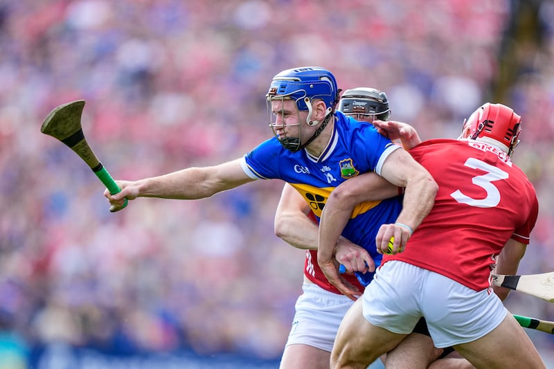 Tipperary's John McGrath in action against Cork. Photograph: James Lawlor/Inpho