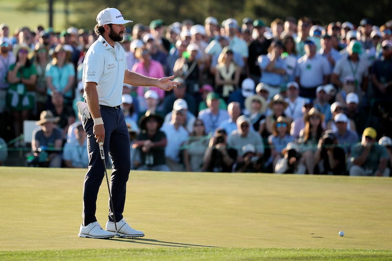 Cameron Young of the United States reacts on the 18th green. Photograph: Hector Vivas/Getty