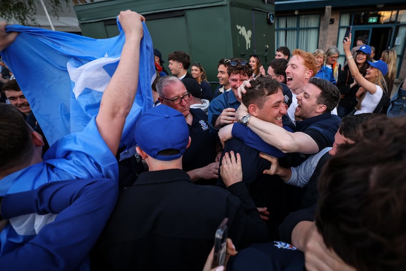 Dan Goggin is welcomed by fans at St Mary's College RFC following their victory in the AIL final on Sunday. Photograph: Ben Brady/Inpho