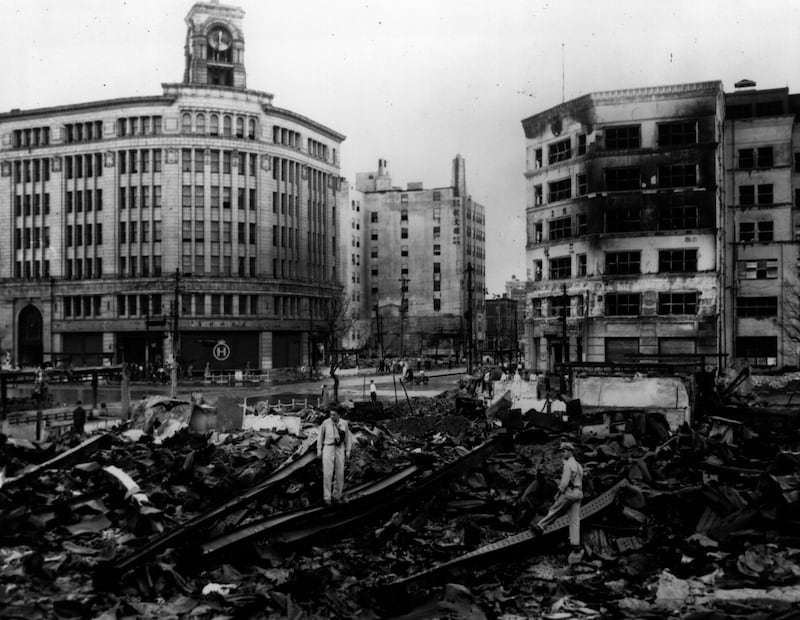 US soldiers examine the results of a B-29 Superfortress bomb run on the streets of the Ginza district, Tokyo, in June 1945. Two months later the US would drop atomic bombs on Japan. Photograph: Getty