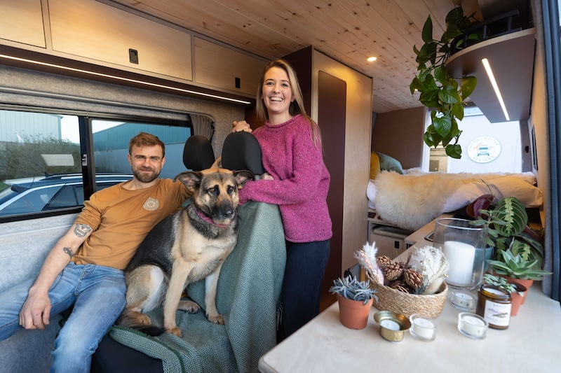 The couple's diesel van has solar panels on the roof with split chargers that charge all the devices and battery white they drive, Martin Byford explains. Photograph: Eamon Ward