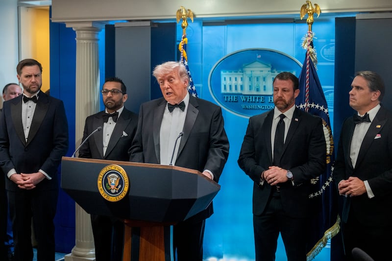 US Vice President JD Vance, from left, Kash Patel, director of the Federal Bureau of Investigation (FBI), US President Donald Trump, Markwayne Mullin, secretary of the US Department of Homeland Security (DHS), and Todd Blanche, acting US attorney general, during a news conference in the James S. Brady Press Briefing Room of the White House in Washington, DC, US on Saturday, April 25, 2026. President Donald Trump and Vice President JD Vance were evacuated from the White House Correspondents' Association dinner event in Washington Saturday following a security incident at the venue. Photographer: Daniel Heuer/Bloomberg