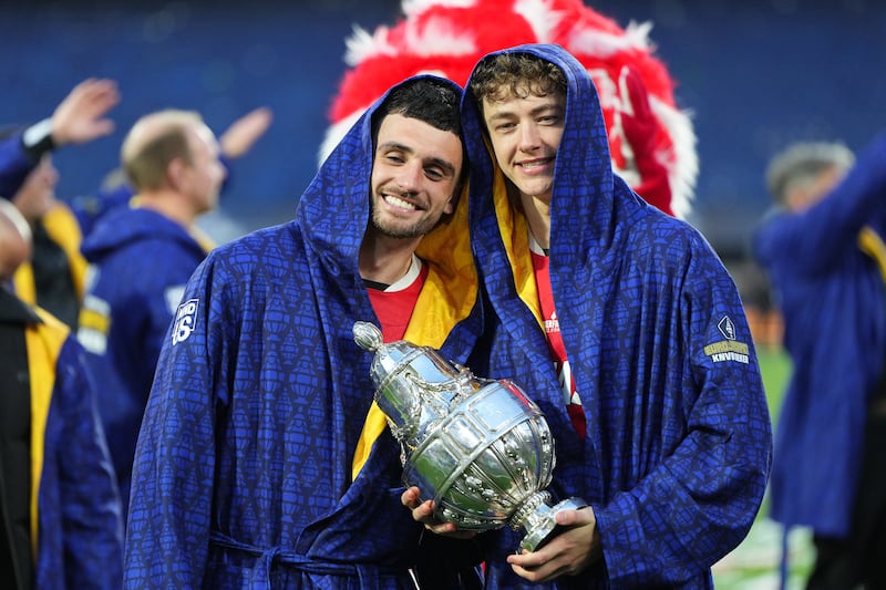 Troy Parrott and Sven Mijnans of AZ Alkmaar pose for a photo after their victory in the Eurojackpot KNVB Beker final. Photograph: Alex Bierens de Haan/Getty