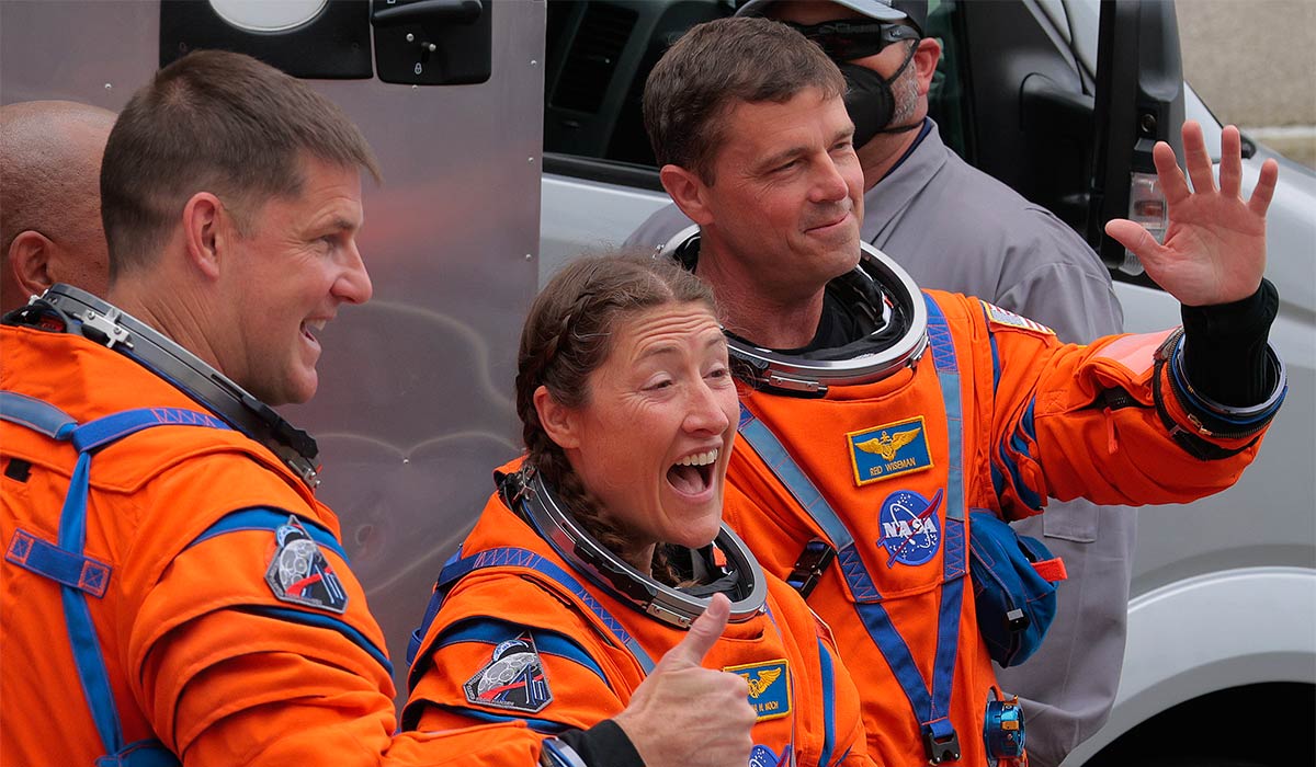 Mission specialist Jeremy Hansen of CSA (Canadian Space Agency), mission specialist Christina Koch, commander Reid Wiseman and pilot Victor Glover (obscured) wave to NASA employees as they depart the Neil A. Armstrong Operations and Checkout Building ahead of the launch of the Artemis II at NASA’s Kennedy Space Center. Pic: Getty Images