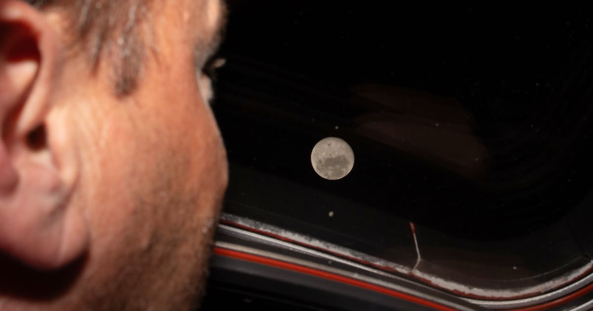 Artemis II astronauts embrace after setting new space-distance record – The Irish Times