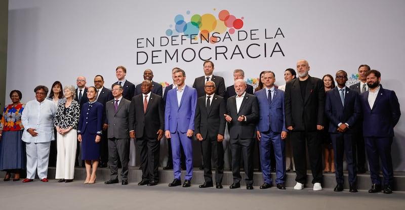 A number of world leaders, including President Catherine Connolly (front row, third from left) pose for a group photograph at Meeting in Defence of Democracy, a gathering in Barcelona of leftist leaders. Photograph: Oscar DEL POZO/AFP via Getty Images