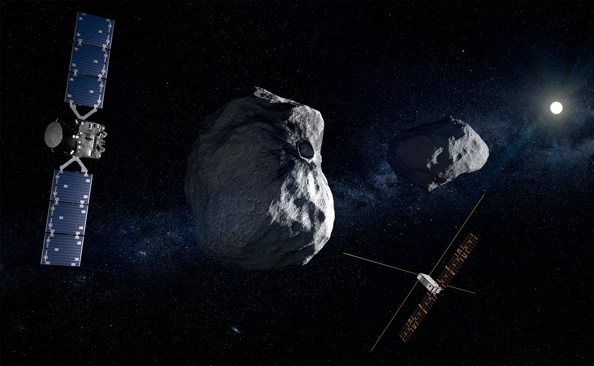 Hera spacecraft and cube sat next to twin asteroids