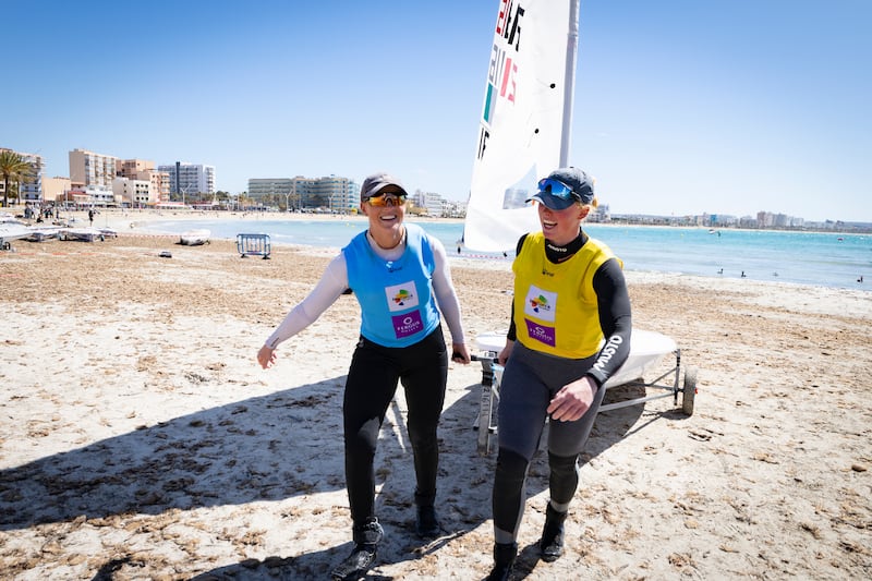 Daisy Collingridge assists Eve McMahon with taking her boat from the water in Mallorca after the final race. Photograph: David Branigan/Oceansport