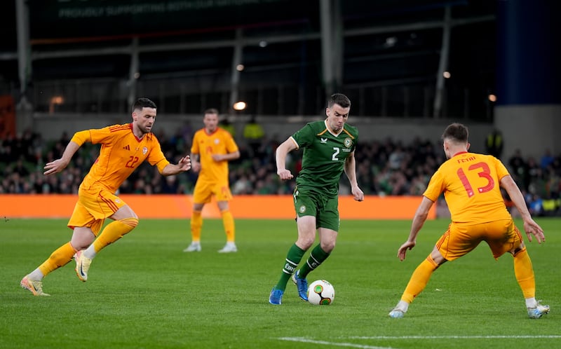 Séamus Coleman battles for the ball with North Macedonia's Isnik Alimi and Imran Fetai on Tuesday at the Aviva Stadium. Photograph: Niall Carson/PA