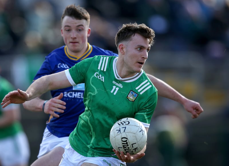 Limerick's James Naughton with John Paul Nolan of Wicklow in a March 2025 Division 4 match in Wicklow. Photograph: Leah Scholes/Inpho
