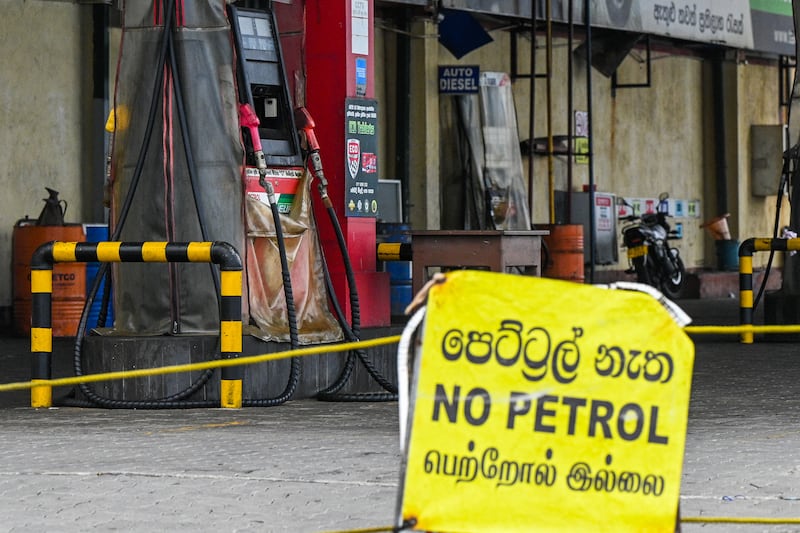 A sign reading No Petrol' is seen at a closed Ceylon Petroleum Corporation fuel station in Sri Lanka's capital city, Colombo, 2022. Photograph: Ishara S. Kodikara/AFP via Getty Images