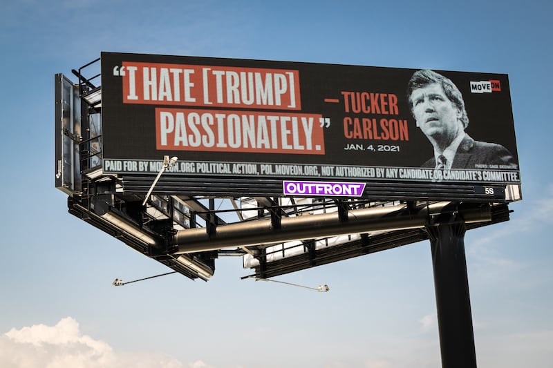 A billboard in Palm Beach on the highway approach to Mar-a-Lago, Trump's Florida residence, in April 2023. Photograph: Jason Koerner/Getty Images for MoveOn Political Action