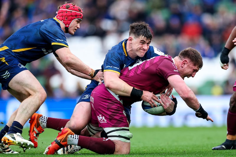 Leinster's Dan Sheehan tackles Jacques Vermeulen of Sale Sharks at the Aviva Stadium. Photograph: Dan Clohessy/Inpho