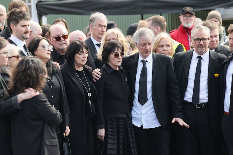 Moya Brennan's family members outside the church, including Enya and her brother Pól (centre). Photograph: Alan Betson

