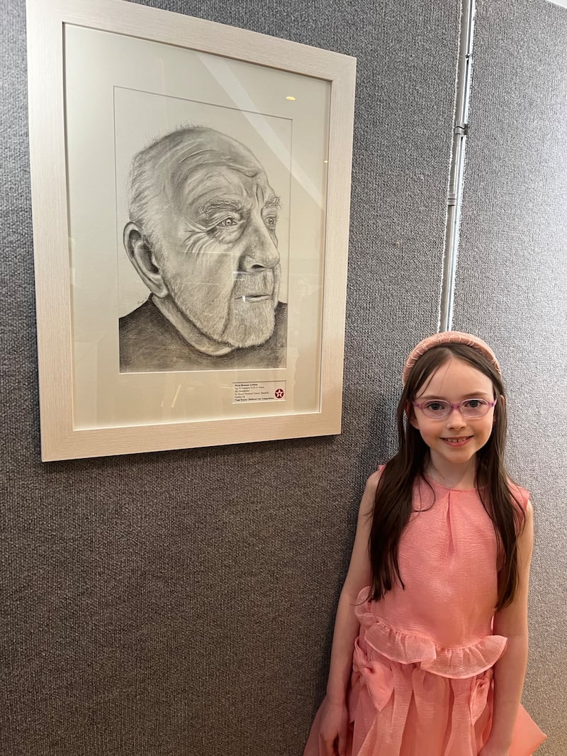 Maya Brennan Lawless (9) was named a winner for her pencil portrait of her grandfather. Photograph: Tim O'Brien