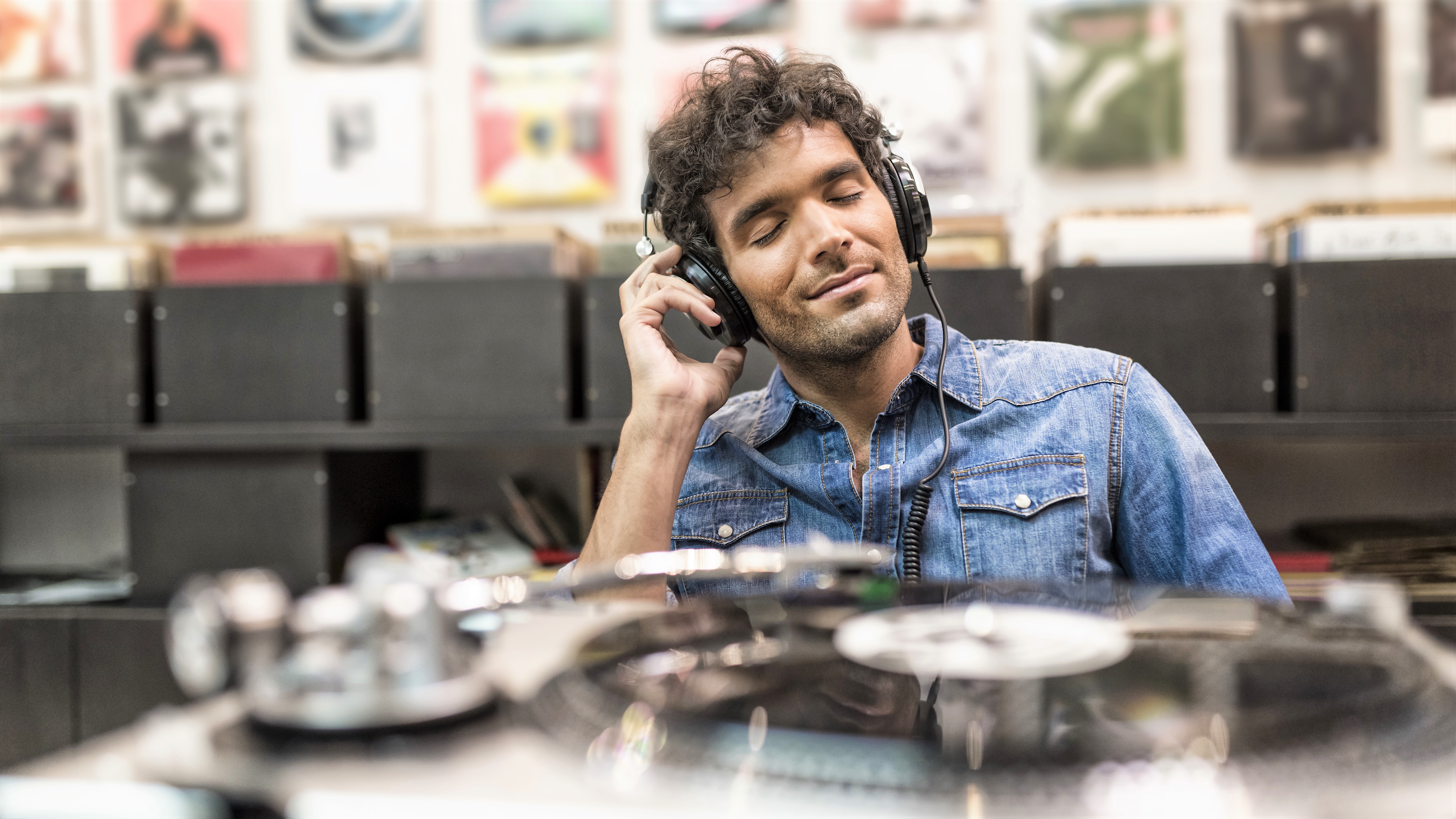 Man listening to music in a record store