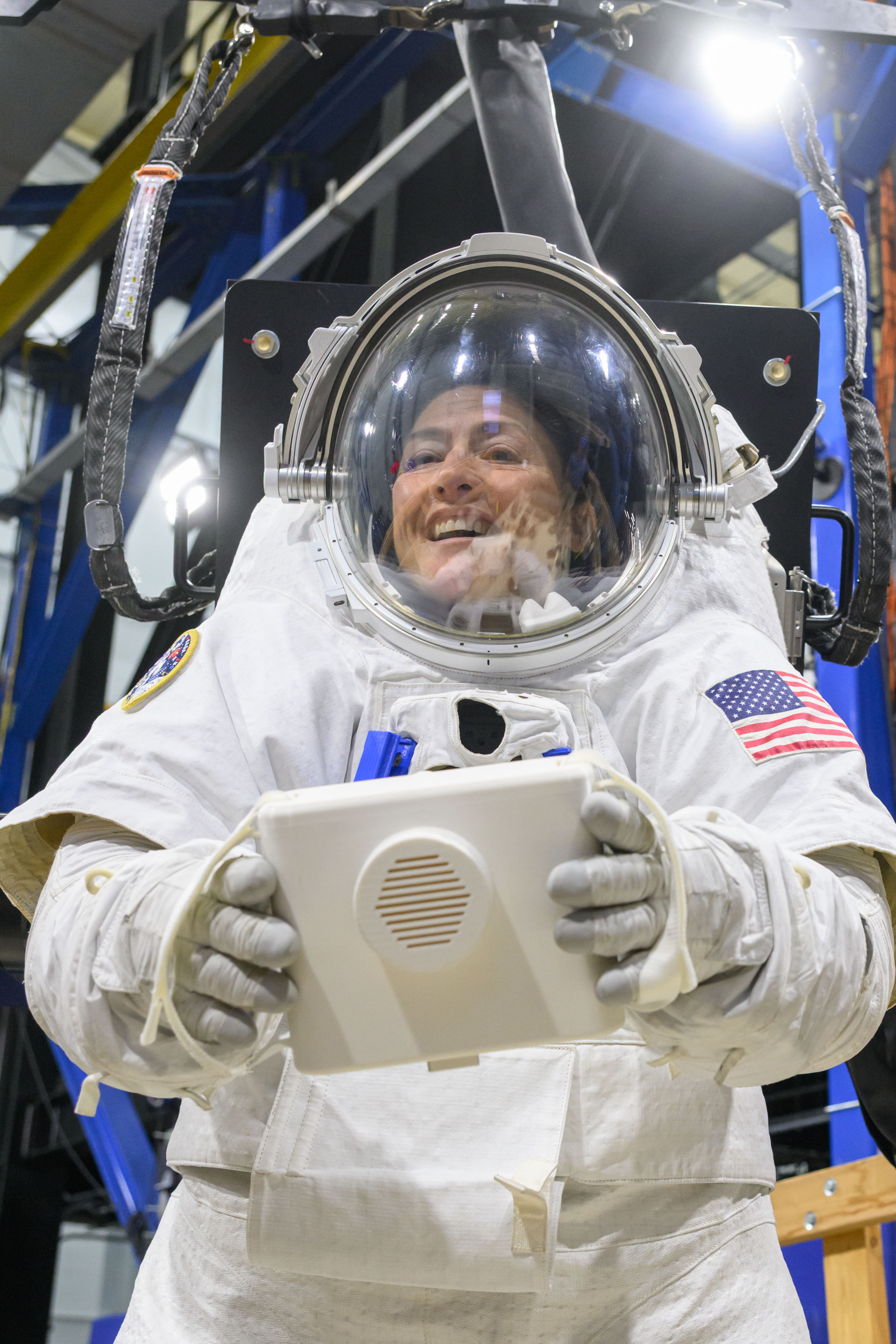 Artemis II astronaut Christina Koch performing various pre-flight tasks for Artemis Spaceflight Standard Measures Test in xEMU space suit. Location: Bldg. 9 ARGOS. Date: 12/12/2025. Photo credit: NASA/Helen Arase Vargas