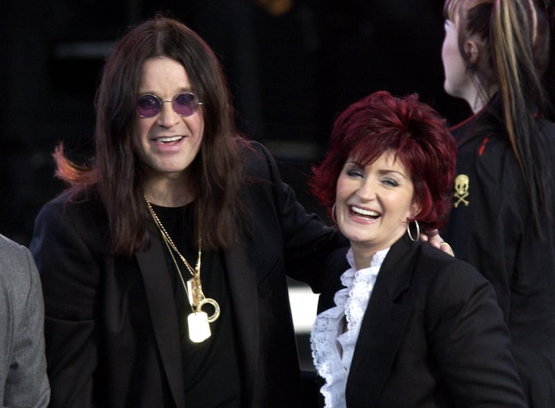 Ozzy and Sharon Osbourne on stage at the Olympic Torch Concert in The Mall, central London. Photograph: Myung Jung Kim/PA Wire