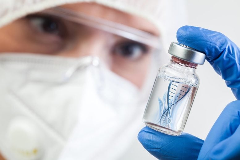 Microbiologist Biotechnician Holding mRNA Vaccine Vial