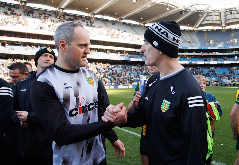 Donegal's Michael Murphy and manager Jim McGuinness shake hands after last month's National Football League Division 1 final victory against Kerry at Croke Park. Photograph: Tom Maher/Inpho