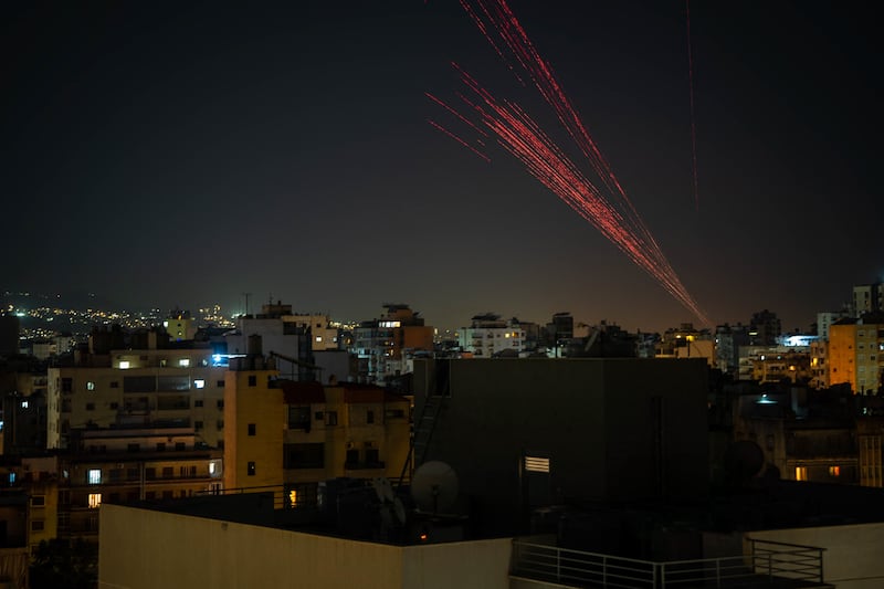 Gunfire is fired into the sky from Beirut's southern suburbs in the early hours of April 17th, as residents celebrate the start of a 10-day ceasefire that took effect at midnight. Photograph by Nael Chahine/Middle East Images/AFP via Getty Images
