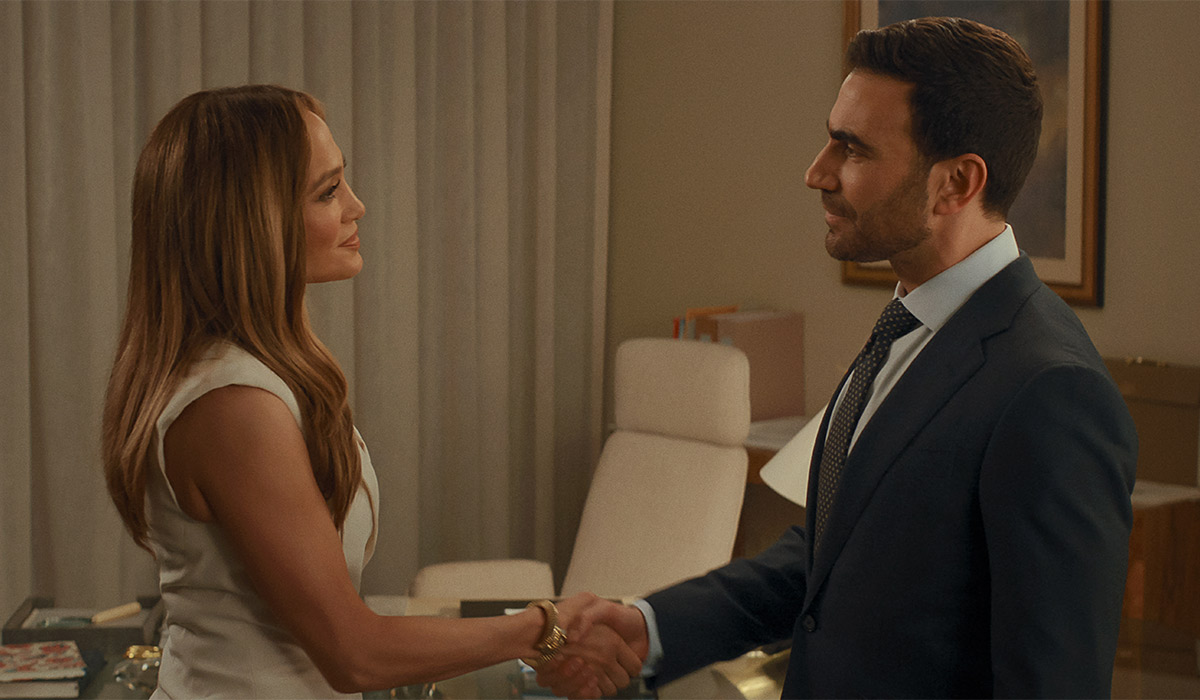 Jennifer Lopez as Jackie Cruz and Brett Goldstein as Daniel Blanchflower in Office Romance. Pic: Netflix