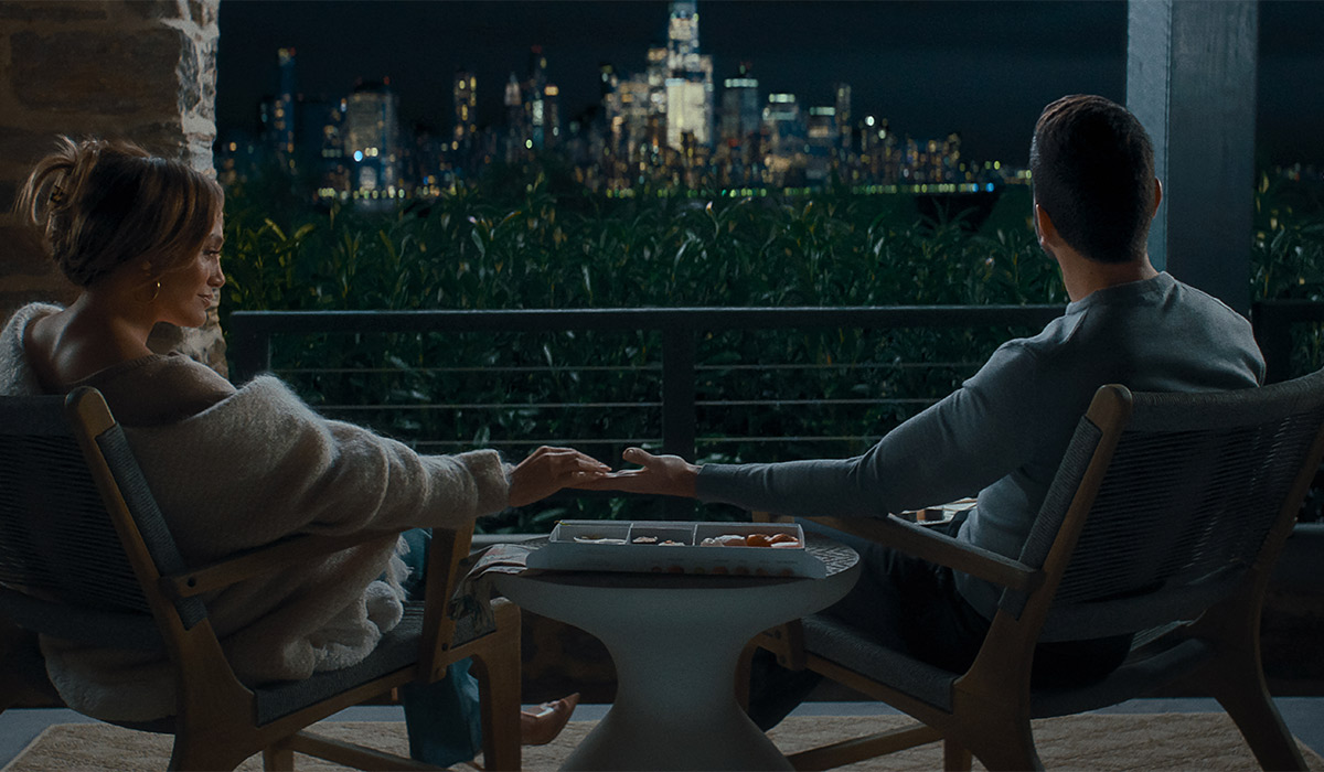 Jennifer Lopez as Jackie Cruz and Brett Goldstein as Daniel Blanchflower in Office Romance. Pic: Netflix