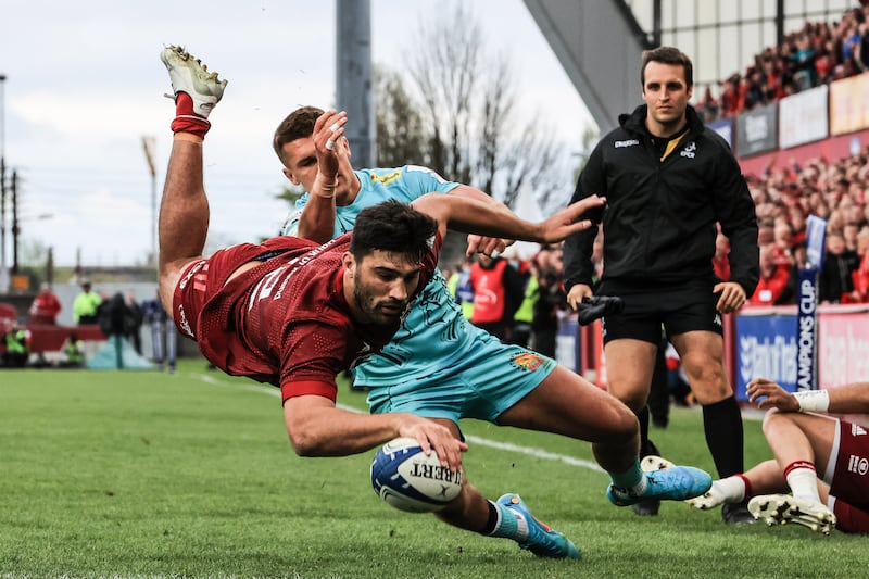 Munster's Damian de Allende scores a try against Exeter Chiefs in a Champions Cup round of 16 match at Thomond Park in 2022. Photograph: Billy Stickland/Inpho