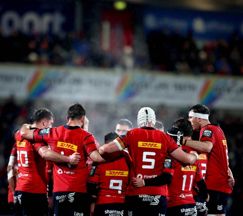 Munster players huddle at their URC game against Ulster last January. Photograph: Ryan Byrne/INPHO