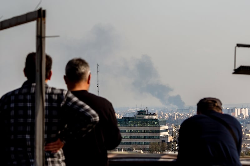 Smoke rises after an air strike in Tehran, Iran, on Wednesday. Photograph: Arash Khamooshi/The New York Times
