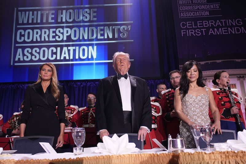 Trump and his wife Melania, with Weijia Jiang, president of the WHCA. Photograph: Yuri Gripas/EPA