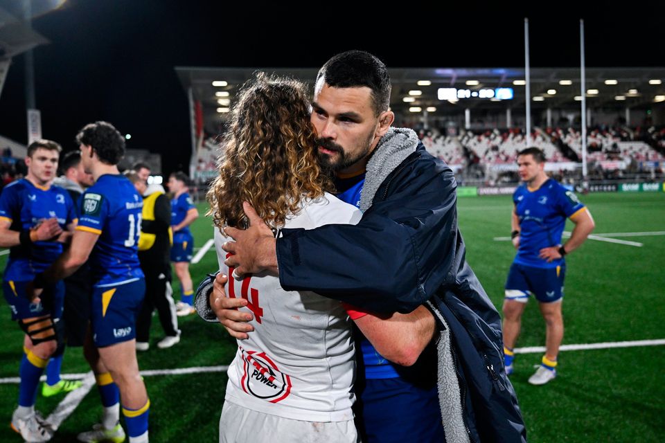 Max Deegan of Leinster and Werner Kok of Ulster after the United Rugby Championship match at Affidea Stadium in Belfast. Photo by Ramsey Cardy/Sportsfile
