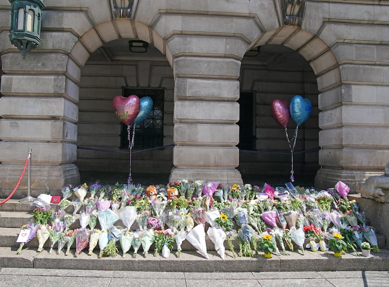 Flowers on the steps of Nottingham Council House after the attack in 2023. Photograph: Peter Byrne/PA Wire