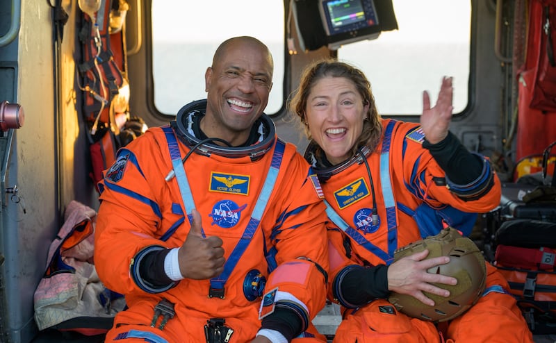Nasa astronaut and pilot Victor Glover and astronaut Christina Koch, Artemis II mission specialist smiling upon return to Earth. Photograph: NASA/Bill Ingalls