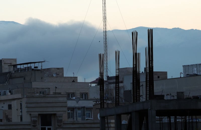 Smoke rises after an air strike in central Tehran. A joint Israeli and US military operation, launched on February 28th, continues to target multiple locations across Iran