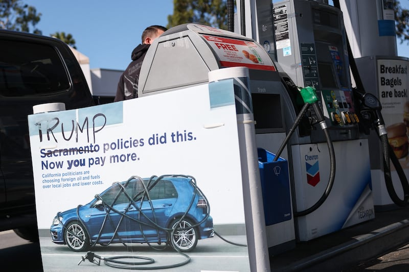 A sign at a Chevron gas station in El Segundo, California. Photograph: Patrick T Fallon/AFP via Getty Images