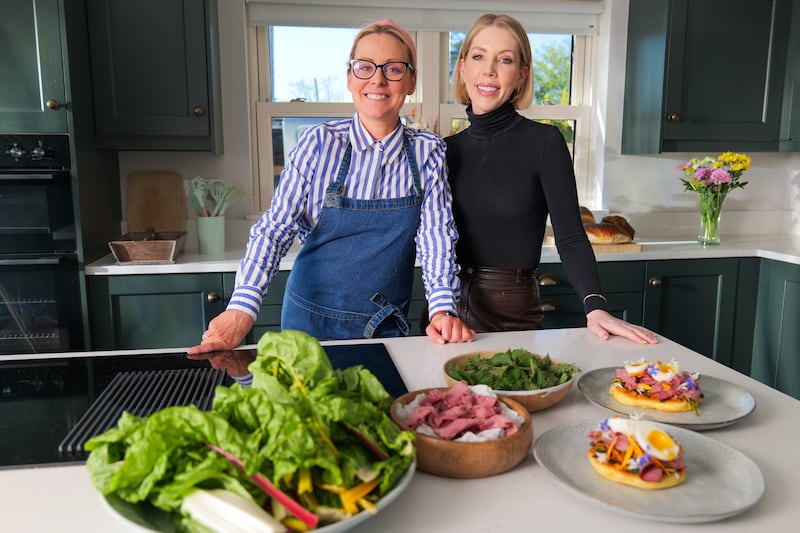 Anna Haugh and Katherine Ryan cooking in the kitchen on Anna Haugh's Big Irish Food Tour. Photograph: BBC NI/Below The Radar/Conal Hughes