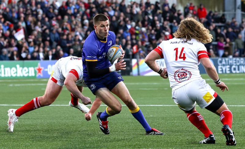 Leinster's Sam Prendergast comes up against Werner Kok of Ulster. Photograph: Grace Halton/INPHO