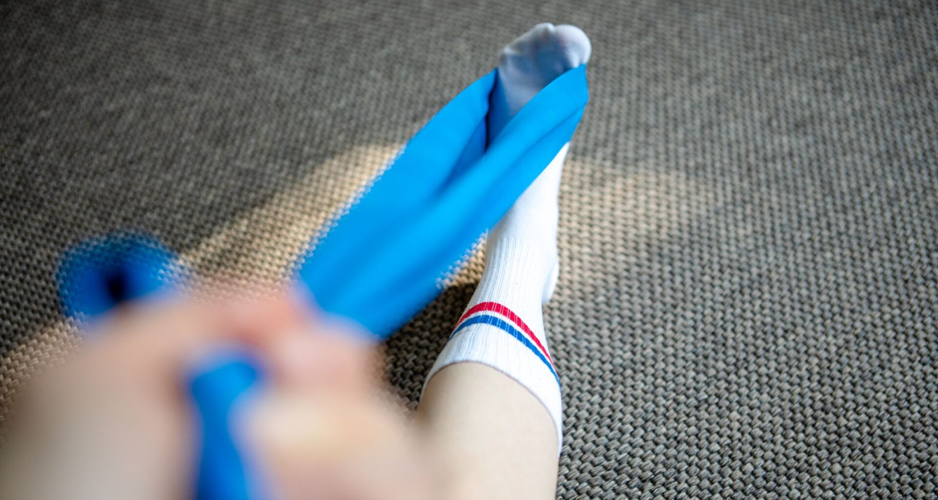 A physical therapist recommends this 15-minute resistance band routine to build strong ankles and reduce your risk of injury