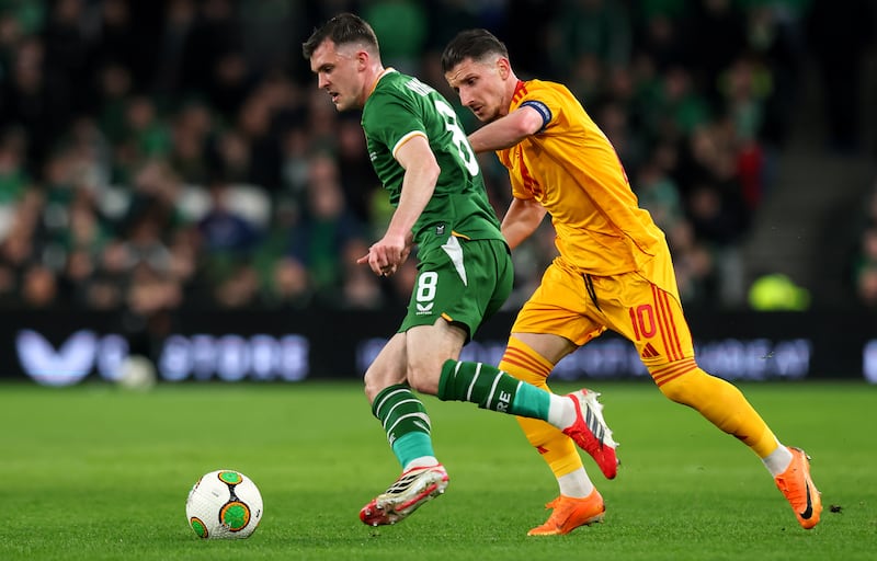 Ireland's Jason Knight and North Macedonia's Enis Bardhi. Photograph: Ryan Byrne/Inpho
