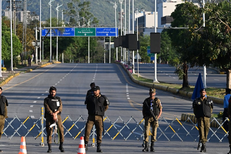 Police officers stand guard in the Red Zone area in Islamabad, Pakistan, where talks between Iran and the US were scheduled to take place. Photograph: Aamir Qureshi/AFP 