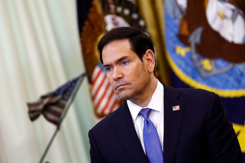 US secretary of state Marco Rubio listens as US president Donald Trump speaks to the media in the Oval Office at the White House on Thursday. Photograph by Will Oliver/EPA