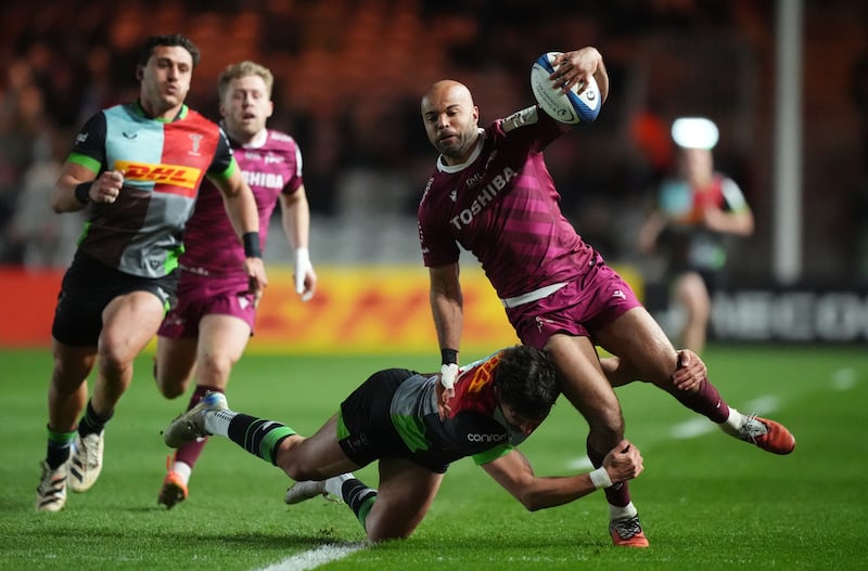 Sale's Tom O’Flaherty is tackled by Harlequins' Nick David during last weekend's Round of 16 game. Photograph: Ben Whitley/PA