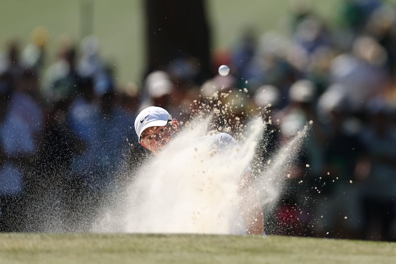 Rory McIlroy plays a bunker shot on the seventh hole during the third round of the 2026 Masters at Augusta. Photograph: Maddie Meyer/Getty Images
