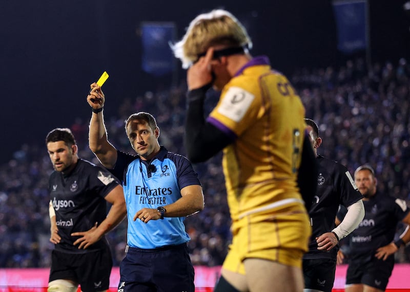 Andrew Brace shows a yellow card to Northampton's Henry Pollock, but the official's decision looked wrong. Photograph: Ben Brady/INPHO
